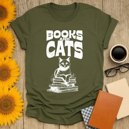 Books & Cats Club T-Shirt featuring a cat on a stack of books, perfect for cozy readers and cat lovers.