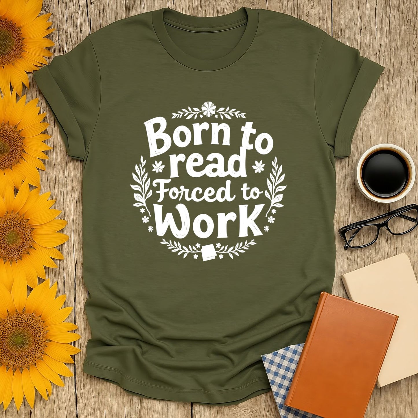Born to read, forced to work tee with leafy design. Perfect gift for cat-loving bookworms who treasure cozy reading moments.