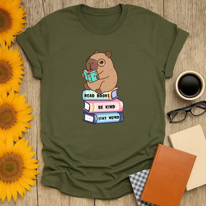 Cozy book shirt featuring a cute capybara reading with text: 'Read Books, Be Kind, Stay Weird.' Perfect gift for book lovers!