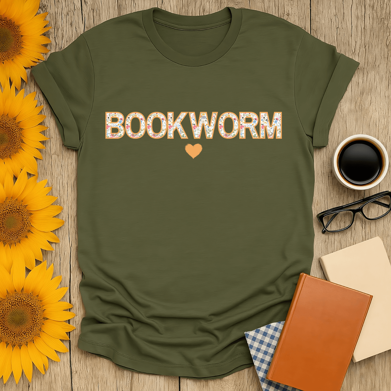 Floral Bookworm T-Shirt for book lovers, featuring vibrant design on olive green fabric, perfect for casual wear.