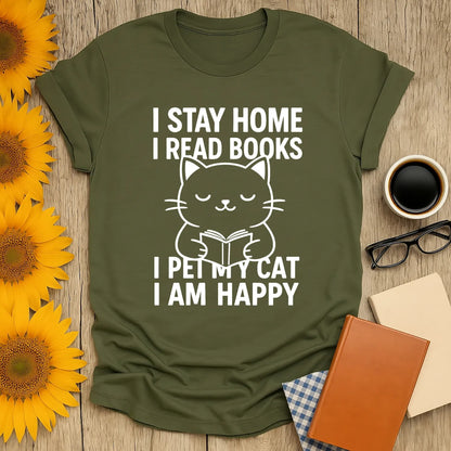 Cozy olive green t-shirt with a happy cat illustration and text: 'I stay home, I read books, I pet my cat, I am happy.' Perfect literary tee for book lovers.