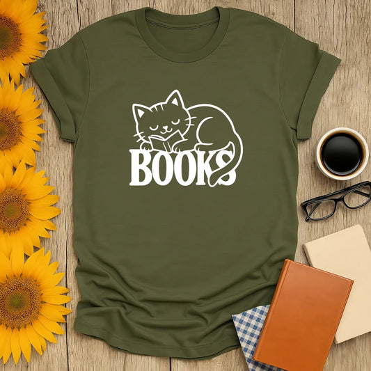 Cozy green t-shirt featuring a sleeping cat and the word "BOOKS"—perfect for book lovers and cat enthusiasts!