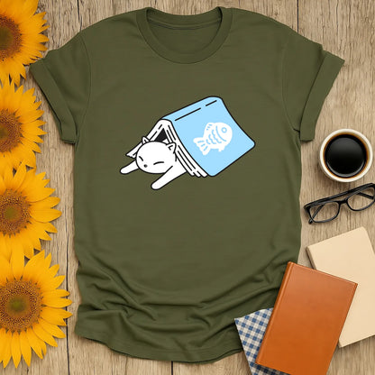 Cozy shirt with a cat hiding in a book, featuring a fish print; perfect for book lovers and cat enthusiasts.