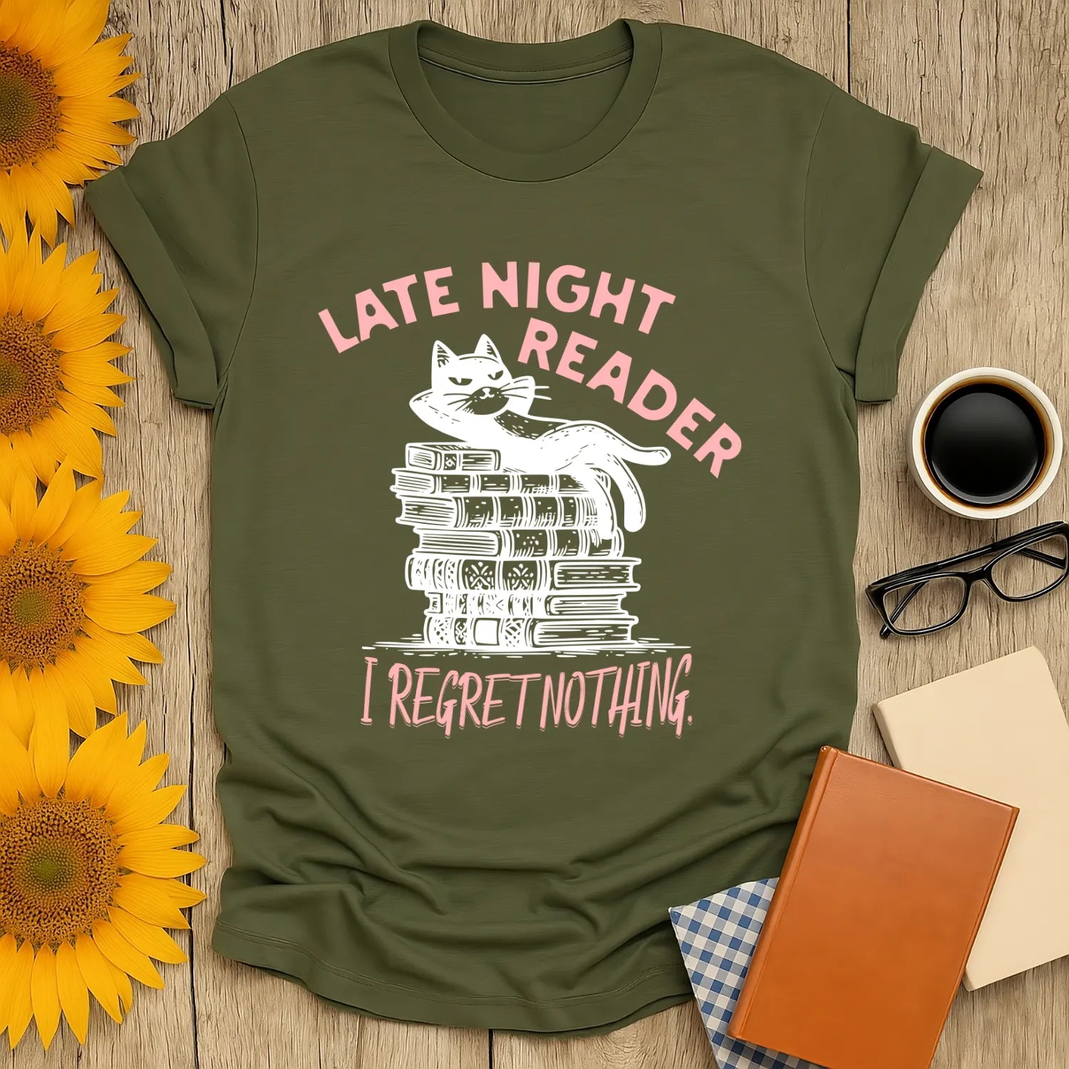 Late Night Reader T-Shirt featuring a relaxed cat on books with the text 'I Regret Nothing' - perfect for book lovers and gifts.