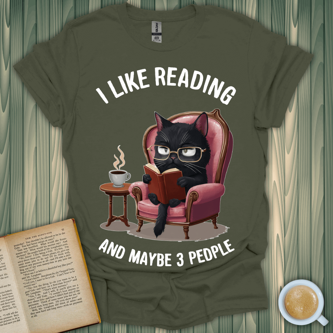 Funny reading t-shirt featuring a cat in glasses, perfect for book lovers and cozy reading sessions.