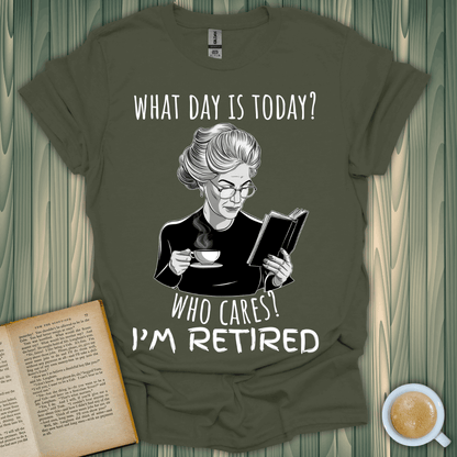 Green t-shirt with "What Day is Today? Who Cares? I'm Retired" design, perfect for book lovers.