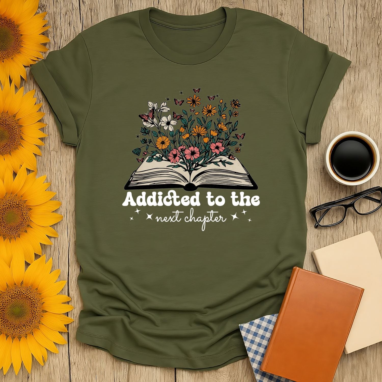 Addicted to the next chapter shirt featuring a floral book design, perfect for cat and coffee-loving bookworms.