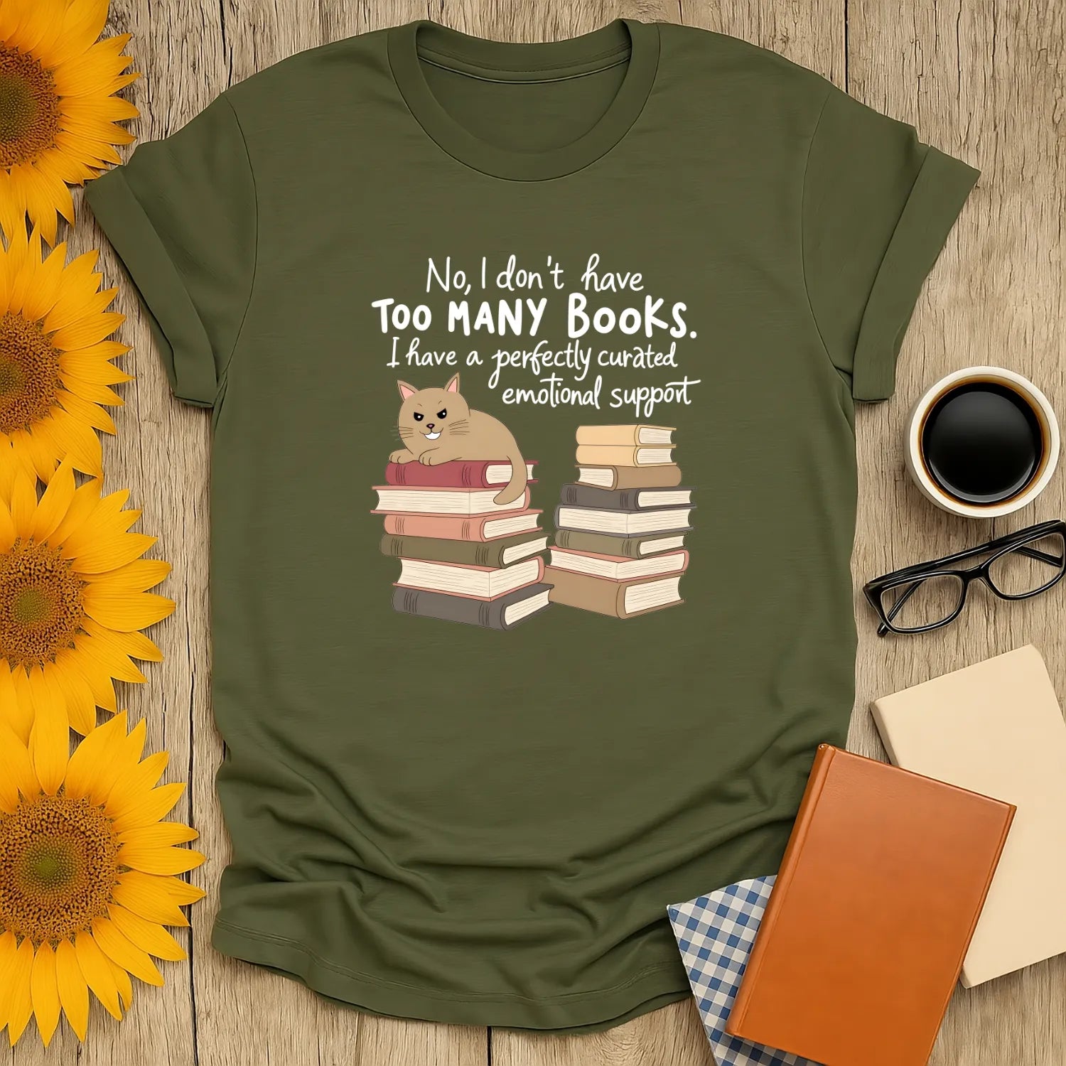 Emotional Support Books T-Shirt featuring a cat over book stacks, cozy reading vibe, relaxed fit unisex tee for readers 📖