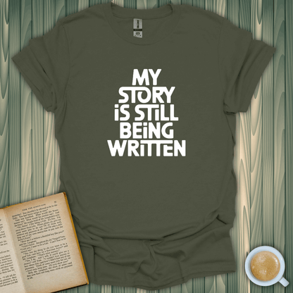 Unisex Story Still Writing T-Shirt for book lovers, 100% cotton, breathable, pre-shrunk, made in the USA.