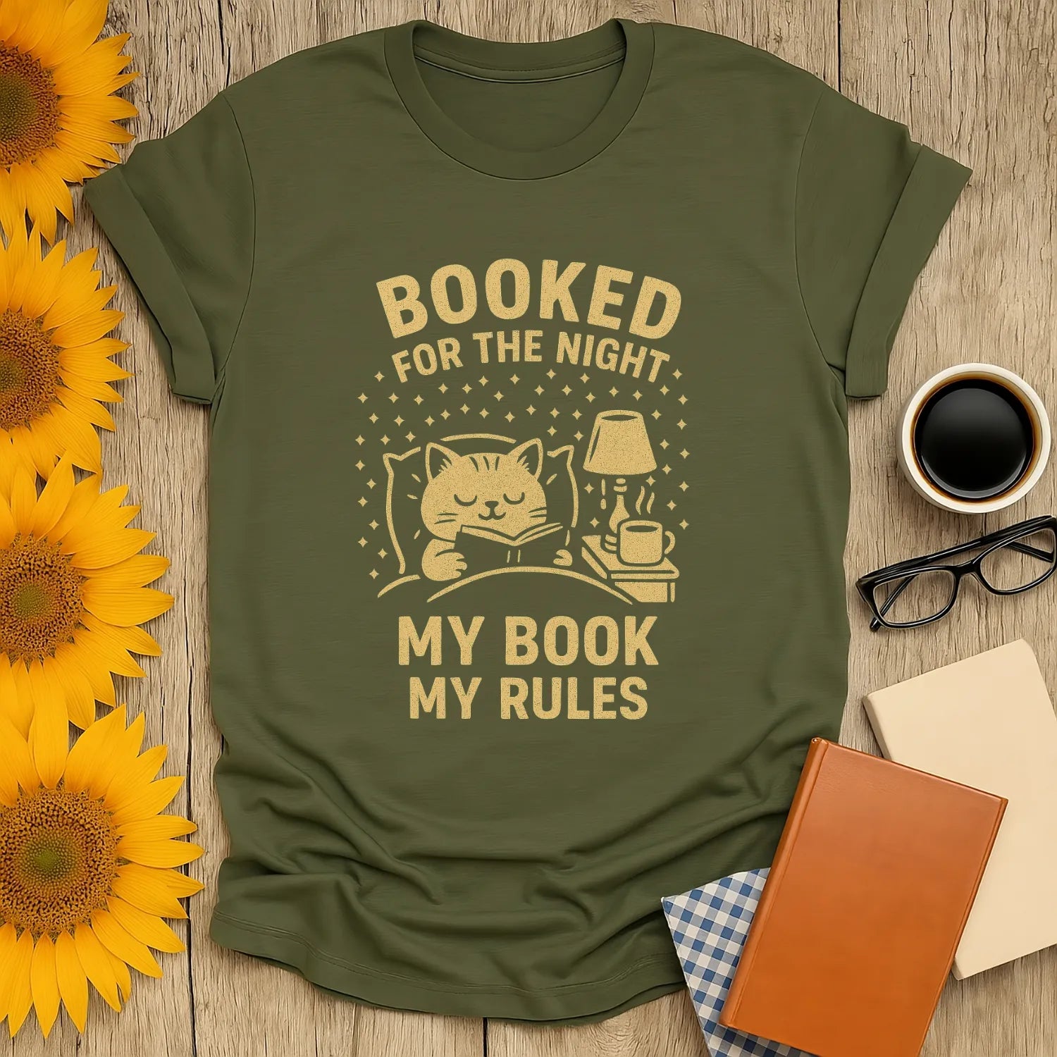 Cozy 'Booked for the Night' shirt featuring a cat, book, and text for book lovers. Perfect gift for cat and coffee fans!