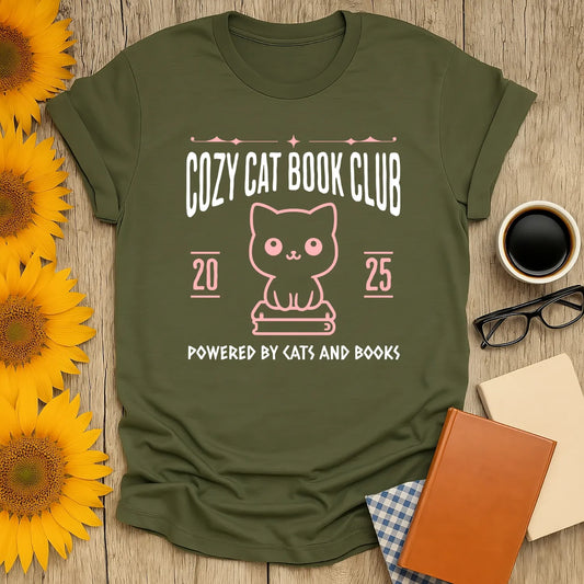 Cozy Cat Book Club T-Shirt featuring a cute cat illustration and text, perfect gift for book lovers and cat fans.