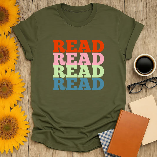 Cozy book lover shirt featuring colorful 'READ' text; perfect gift for readers who love cats, coffee, or tea.
