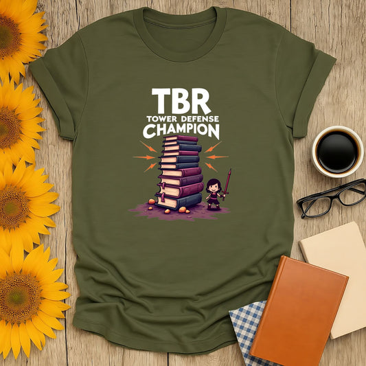 TBR Tower Defense Champion T-Shirt featuring playful book design, perfect for book lovers.