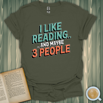 Unisex t-shirt featuring 'I Like Reading and Maybe 3 People' design, perfect for book lovers. 100% cotton, comfy fit.