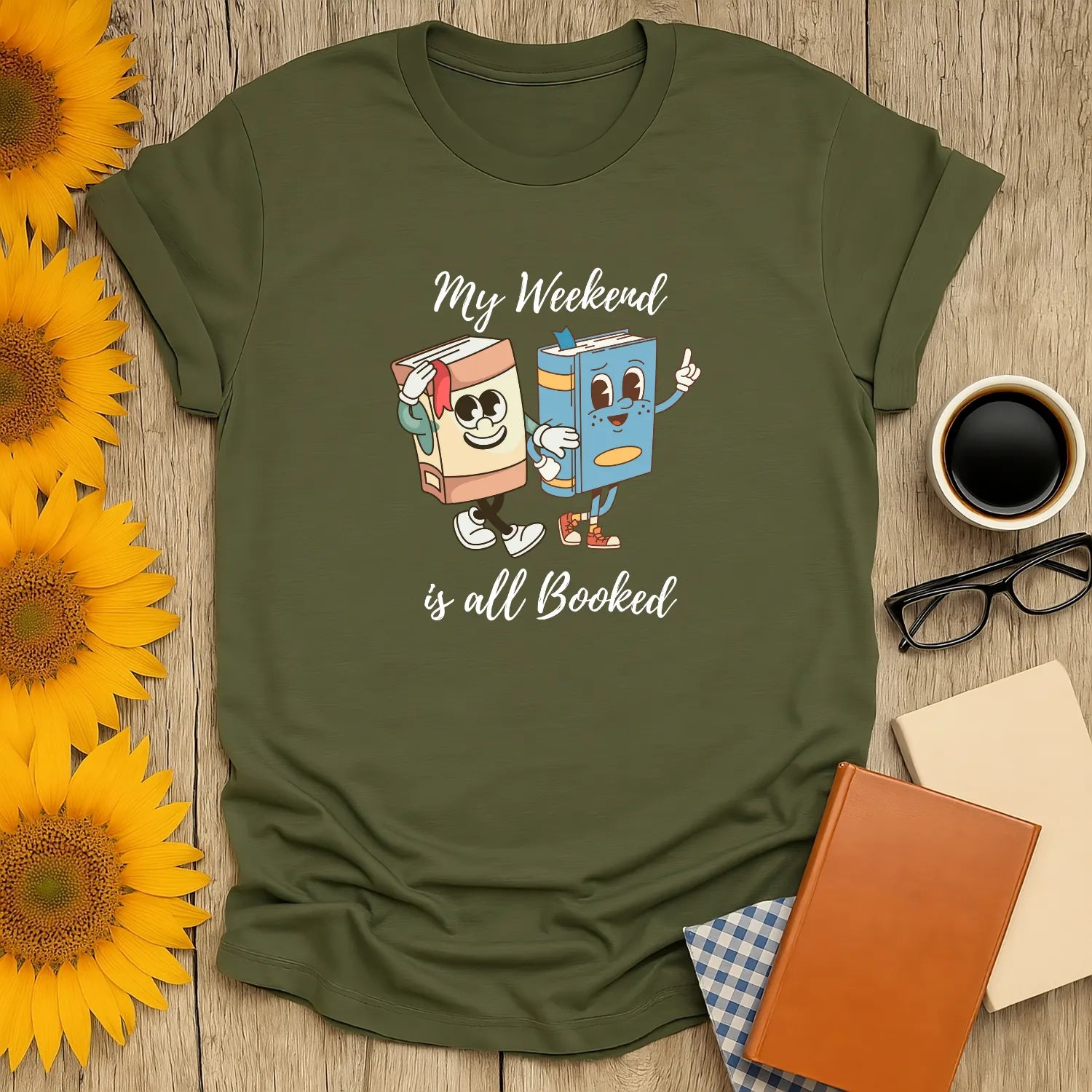 All Booked Weekend T-Shirt featuring cute animated books, perfect cozy reading outfit for book lovers. 📖 Organic cotton, relaxed fit.