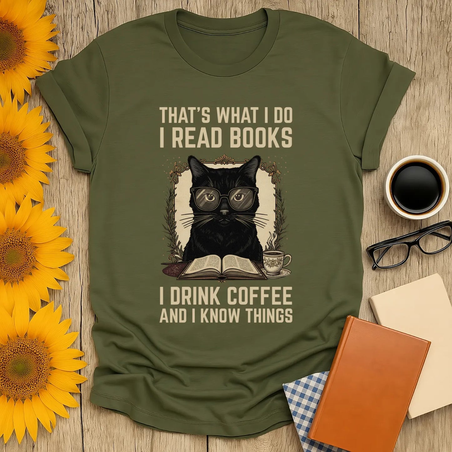 Coffee Cat Reader T-Shirt with a black cat in glasses, sipping coffee and reading, perfect for book lovers and cozy vibes.