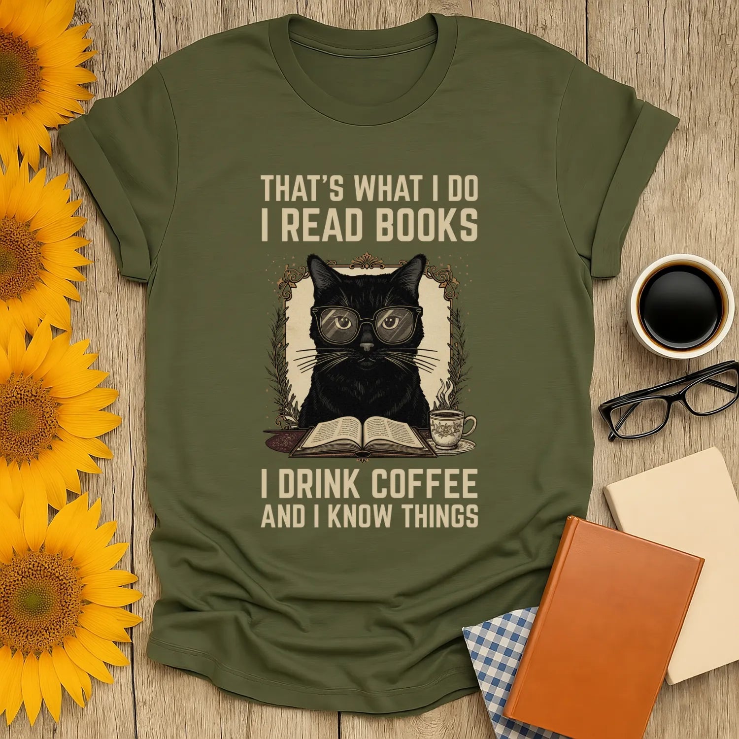 Coffee Cat Reader T-Shirt with a black cat in glasses, sipping coffee and reading, perfect for book lovers and cozy vibes.