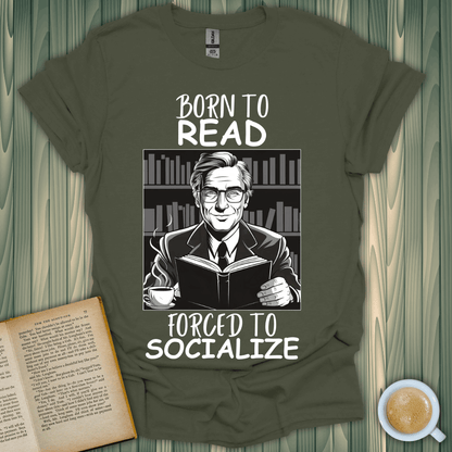 Born to Read, Forced to Socialize T-Shirt for book lovers, featuring a graphic of a man reading with a bookshelf background.