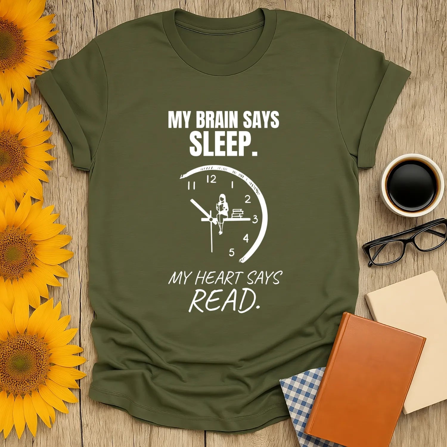 Green shirt with a clock and text: "My brain says sleep. My heart says read." Perfect for book lovers and cozy readers.