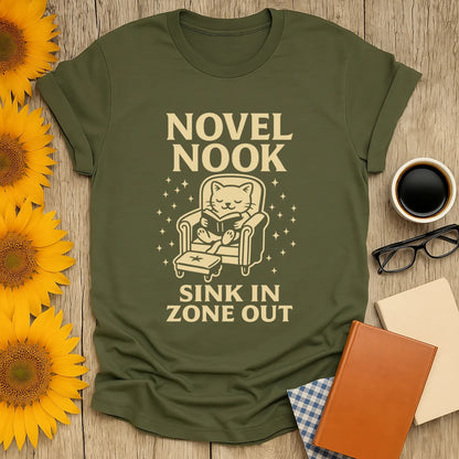Cozy Novel Nook t-shirt featuring a cat reading, perfect for book lovers who enjoy a good tea or coffee break.