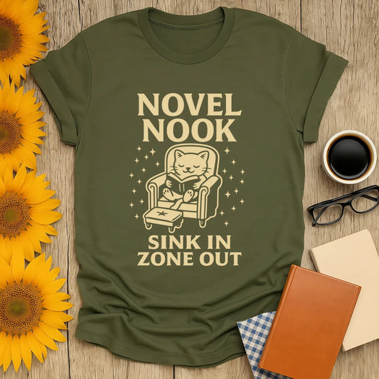 Cozy Novel Nook t-shirt featuring a cat reading, perfect for book lovers who enjoy a good tea or coffee break.