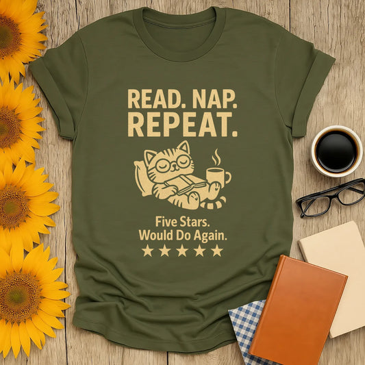 Funny book lover shirt featuring a content cat with coffee, reading "Read. Nap. Repeat." – perfect gift for cozy readers.