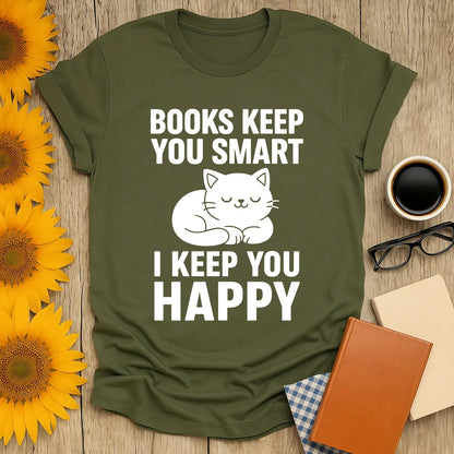 Cozy olive tee featuring a sleeping cat and text 'Books Keep You Smart, I Keep You Happy' – perfect gift for readers and cat lovers.