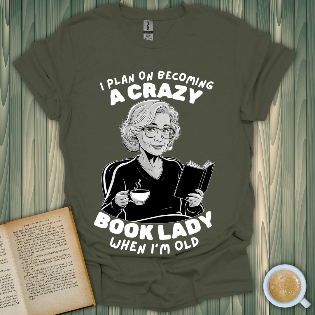 Funny Crazy Book Lady T-Shirt for book lovers featuring an older woman enjoying tea and reading.