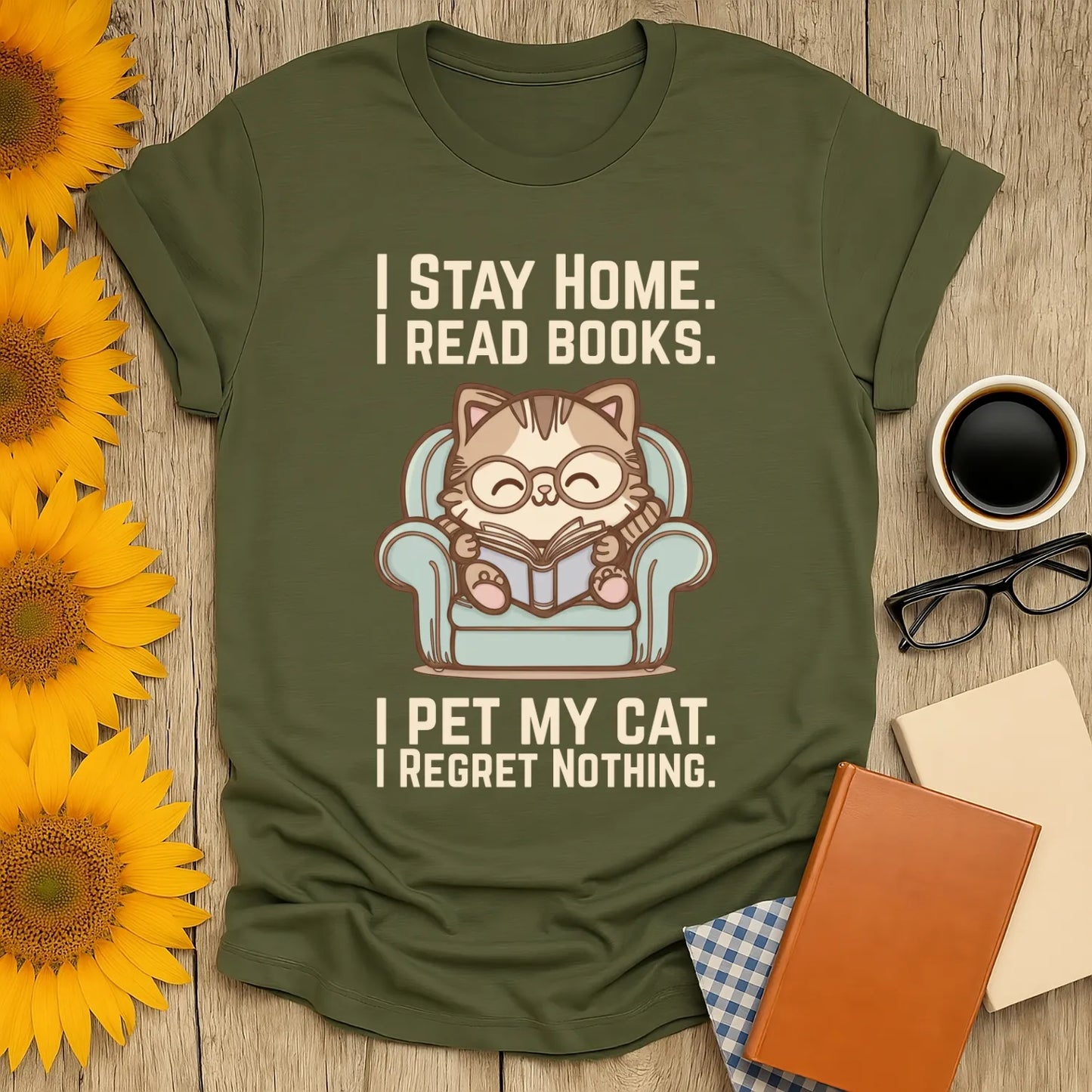 Comfy Cat Reader T-Shirt featuring a cozy cat in glasses reading at home, perfect for book lovers and cat enthusiasts.