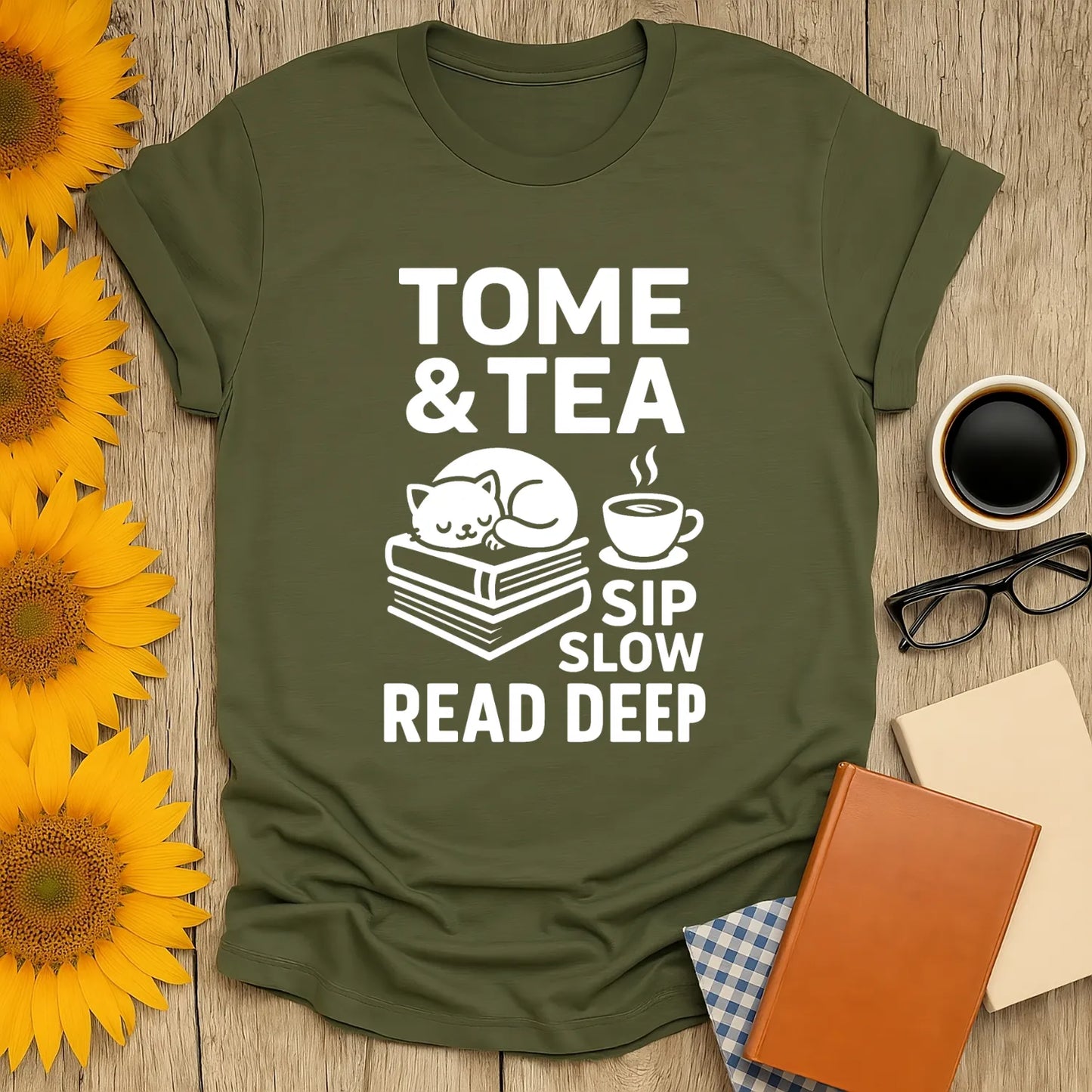 Cozy Tome & Tea shirt with a napping cat on books and a cup, perfect for book lovers who enjoy tea and humor.