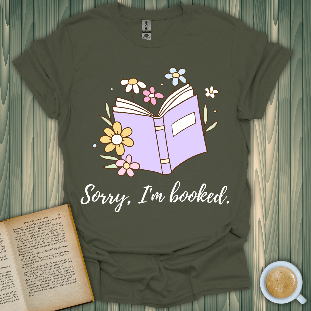 Sorry I'm Booked t-shirt for book lovers, featuring a cute book and floral design. Made of 100% ring-spun cotton.