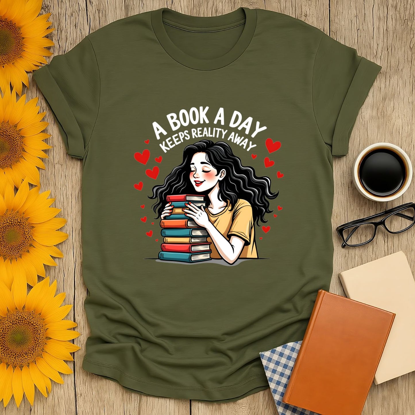 Book lover shirt featuring a cheerful woman hugging stacked books with hearts, saying 'A Book a Day Keeps Reality Away'.