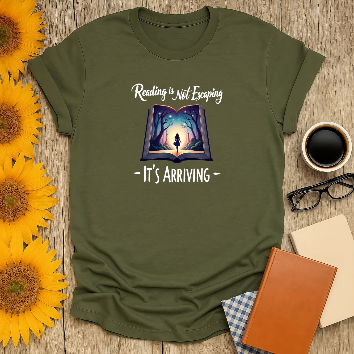 Cozy green book lover shirt with 'Reading is Not Escaping, It's Arriving' design, perfect for cat, coffee, or tea fans.
