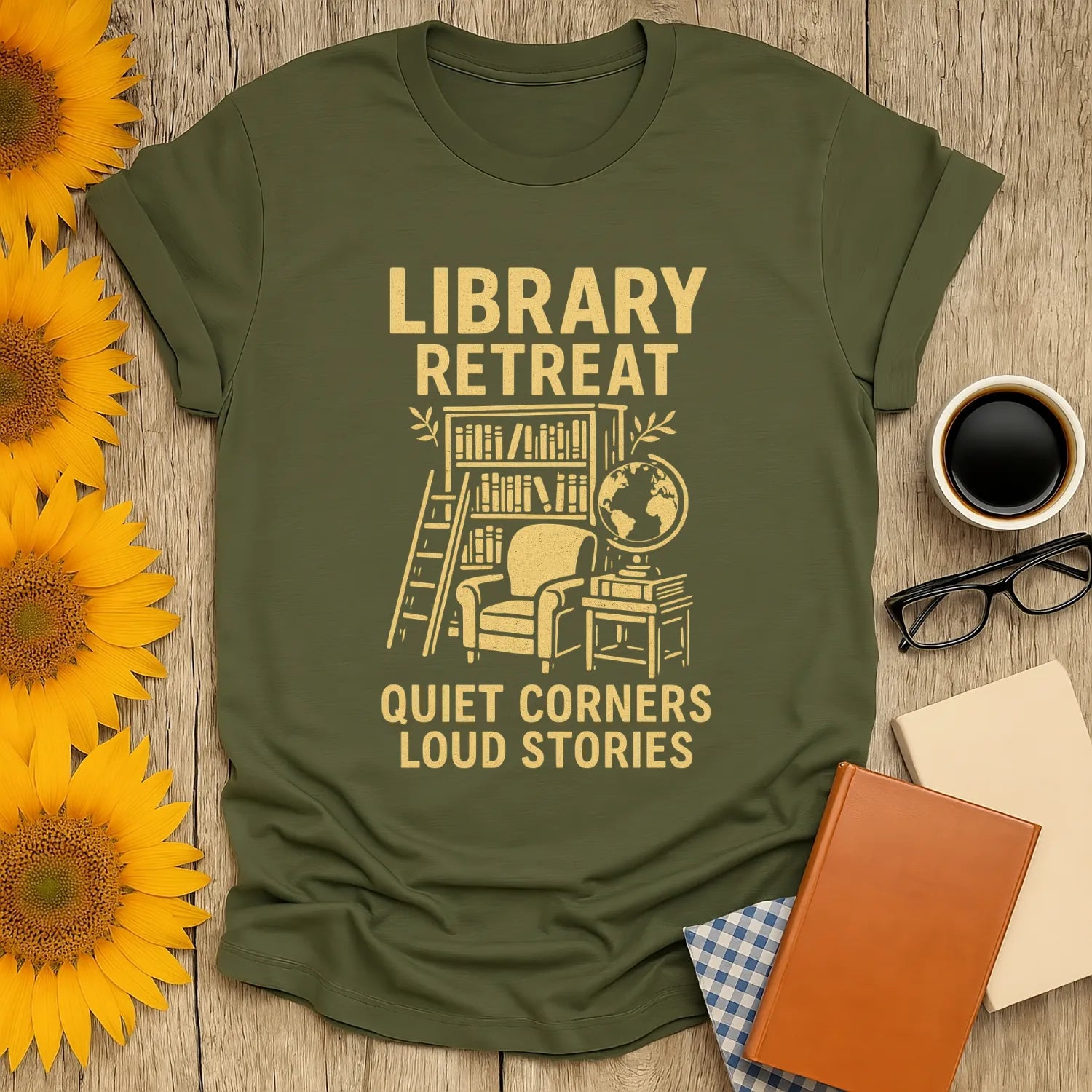 Cozy Library Retreat tee featuring a reading nook, globe & text 'Quiet Corners Loud Stories' – perfect for book lovers!