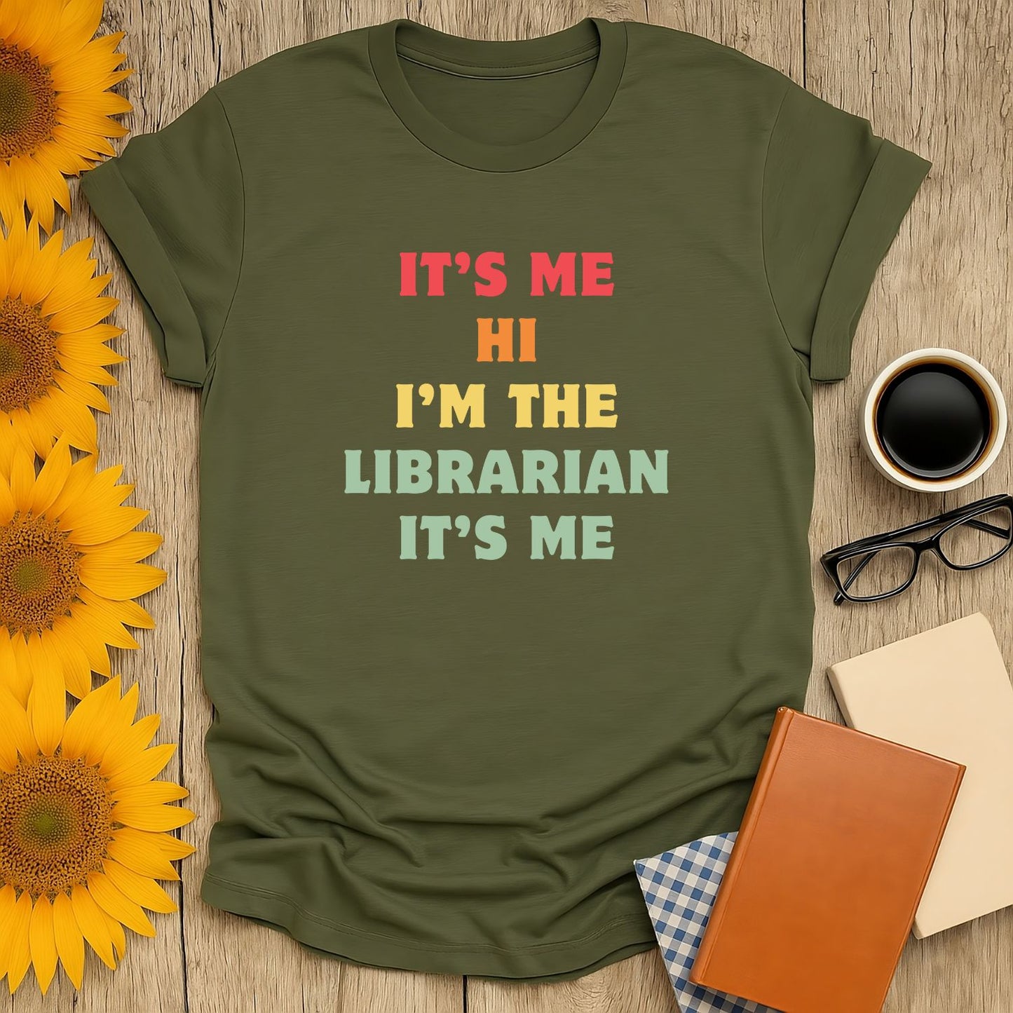 Book lover shirt featuring a playful phrase, 'It's Me Hi I'm The Librarian,' a witty gift for reading enthusiasts.