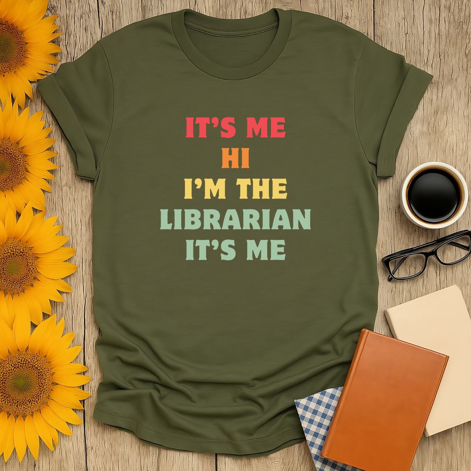 Book lover shirt featuring a playful phrase, 'It's Me Hi I'm The Librarian,' a witty gift for reading enthusiasts.
