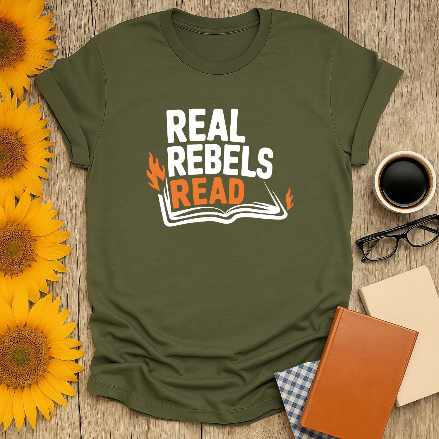 Cozy book shirt featuring 'Real Rebels Read' with an open book illustration, perfect for cat and coffee lovers.
