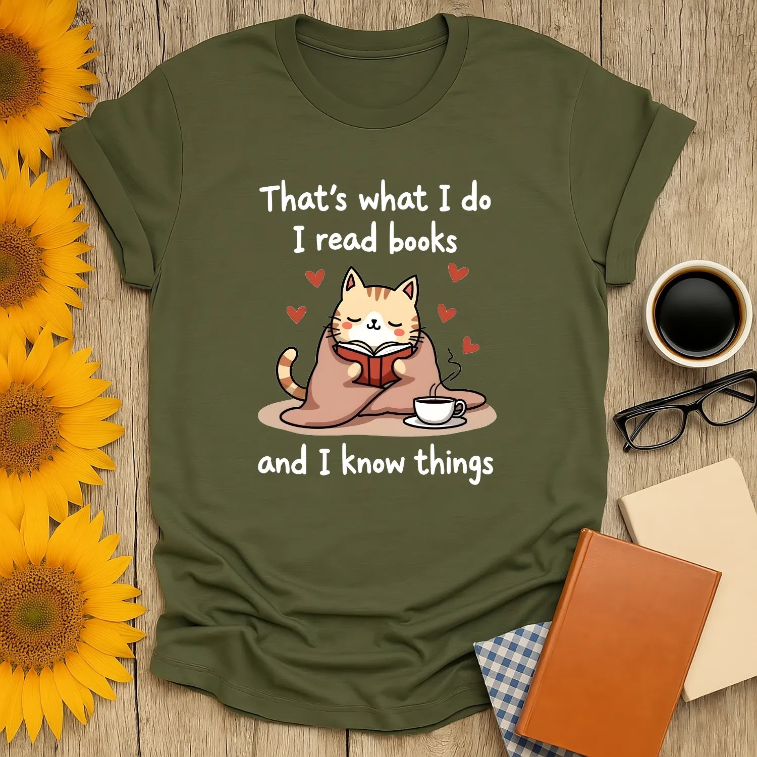 Cozy cat reading shirt with text: 'That's what I do I read books and I know things' – the purrfect gift for book lovers!