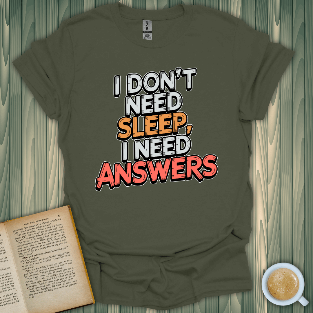 I Need Answers T-Shirt in olive green, perfect for book lovers. Light, breathable fabric with a fun screen-printed design.