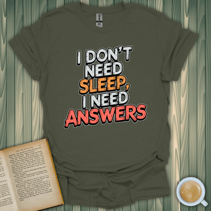 I Need Answers T-Shirt in olive green, perfect for book lovers. Light, breathable fabric with a fun screen-printed design.