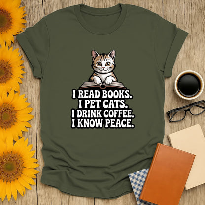 Cozy book lover shirt featuring a cute cat with text: 'I read books. I pet cats. I drink coffee. I know peace.' Perfect gift for readers.