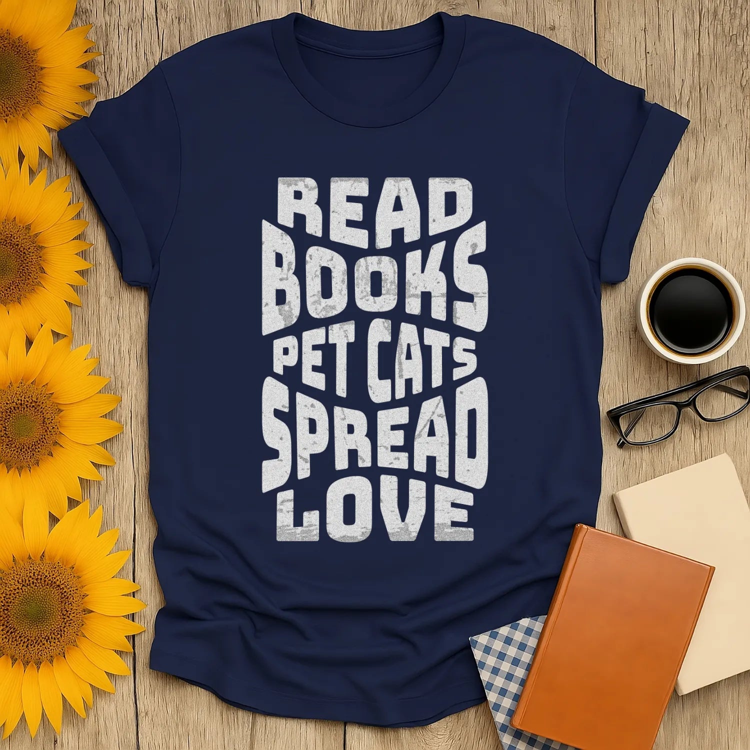 Spread Bookish Love T-Shirt featuring bold text: 'READ BOOKS PET CATS SPREAD LOVE', perfect for cat-loving bookworms.