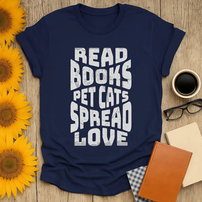 Spread Bookish Love T-Shirt featuring bold text: 'READ BOOKS PET CATS SPREAD LOVE', perfect for cat-loving bookworms.