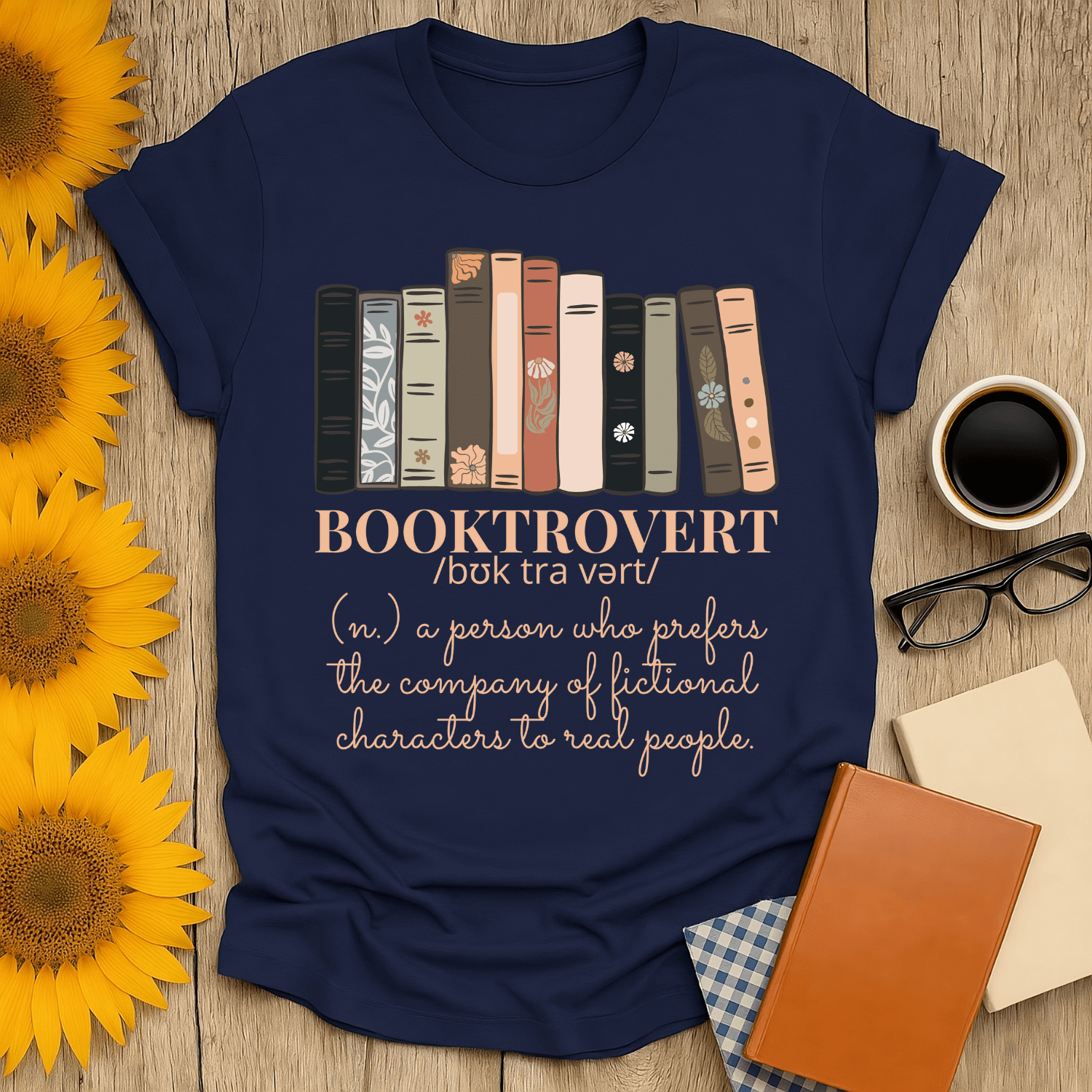 Booktrovert t-shirt featuring book stacks and definition for book lovers, made of ring-spun cotton, unisex fit.