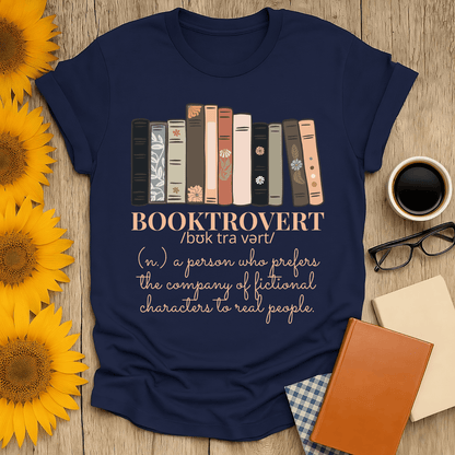 Booktrovert t-shirt featuring book stacks and definition for book lovers, made of ring-spun cotton, unisex fit.