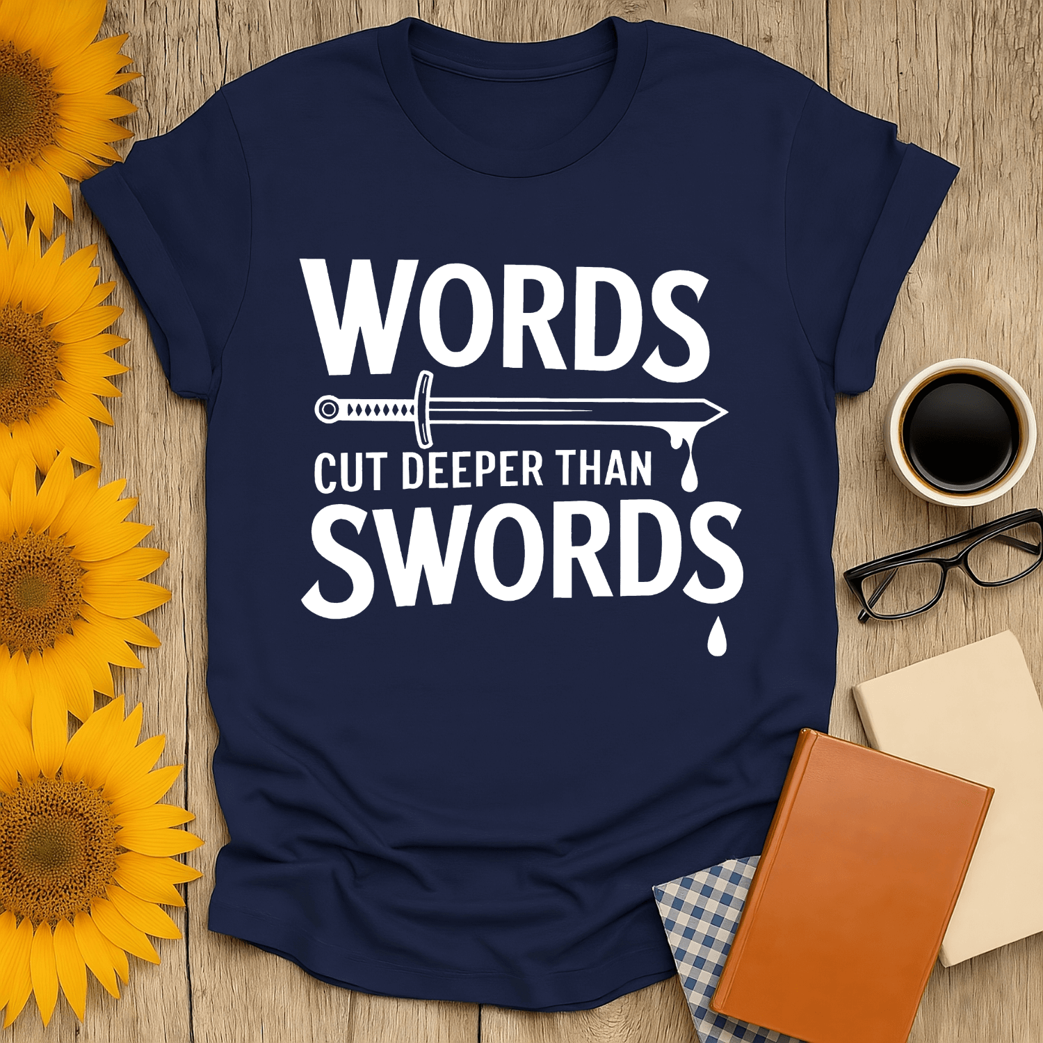 Words Cut Deeper Than Swords T-Shirt for book lovers, unisex fit, 100% cotton, navy blue with sword graphic.