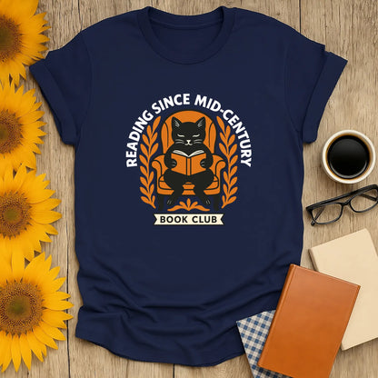 Cozy cat reading shirt for book lovers, featuring a cat with a book. Perfect gift for cat lovers and readers.