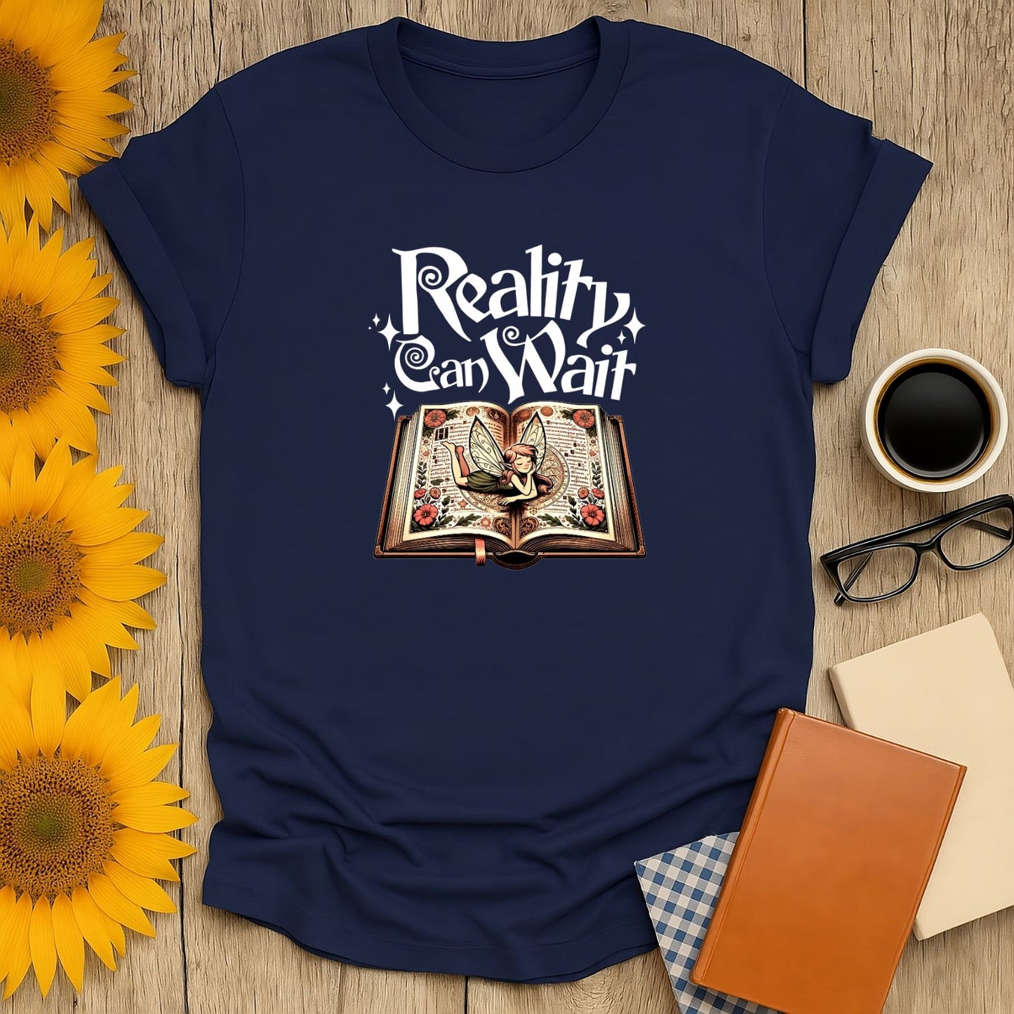 Reality Can Wait T-Shirt features an open book with a whimsical fairy, perfect for book lovers, especially cat and tea fans.