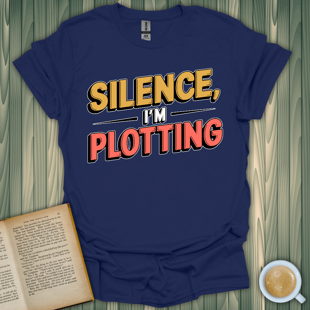 Silence, I'm Plotting T-Shirt for book lovers, made of 100% cotton, unisex fit, perfect for cozy reading days.