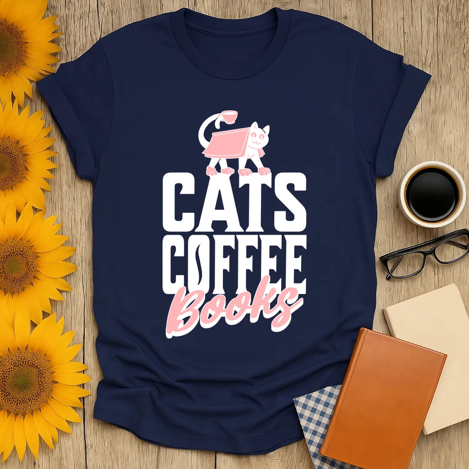 Cozy navy tee featuring playful cat illustration and bold text 'CATS COFFEE Books', perfect for book lovers and gifts.